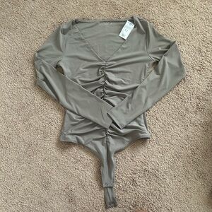 Long sleeve body shirt- soft collection. Color is taupe